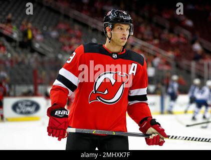 Pittsburgh Penguins center Sidney Crosby (87) and the rest of the Pens  wears green jersey to celebrate St. Patrick's Day during warm-up before the  game with the New Jersey Devils at the