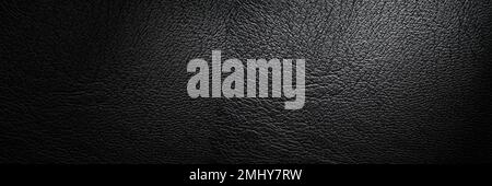 Black leather texture with vignette close-up. Canvas. Packing material. Luxury leather background with empty space for design. Top view web banner Stock Photo