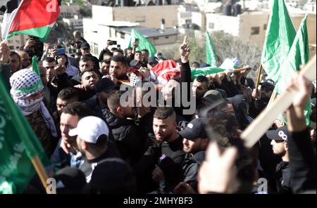Al Ram, Palestine. 27th Jan, 2023. (EDITORS NOTE: Image depicts death)Mourners carry the body of Palestinian Youssef Yahya Abdel Karim Mohsen (22 years old), who was severely wounded by Israeli gunfire and lost his life in the hospital in the town of Al-Ram in East Jerusalem. Palestinian Youssef Yahya Abdel Karim Mohsen (22 years old) was severely wounded by Israeli gunfire and lost his life in the hospital in the town of Al-Ram in East Jerusalem. Credit: SOPA Images Limited/Alamy Live News Stock Photo