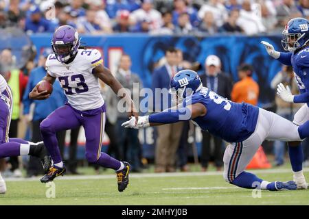 San Francisco 49ers defensive tackle DeForest Buckner (99) and Nick Bosa  (97) prepare to tackle Minnesota Vikings running back Dalvin Cook (33)  during an NFL divisional playoff game, Saturday, Jan. 11, 2020