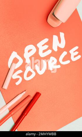 Text caption presenting Open Source. Business concept denoting software which original source code freely available Stock Photo