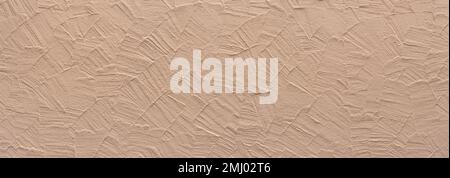 New light brown plaster with abstract design on a wall Stock Photo