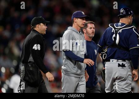 Milwaukee Brewers manager Craig Counsell watches from the dugout during ...