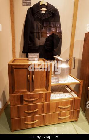 Fruit crate furniture in exhibit about Manzanar life, NPS Visitor Center at Manzanar National Historic Site, Owens Valley, California, USA Stock Photo