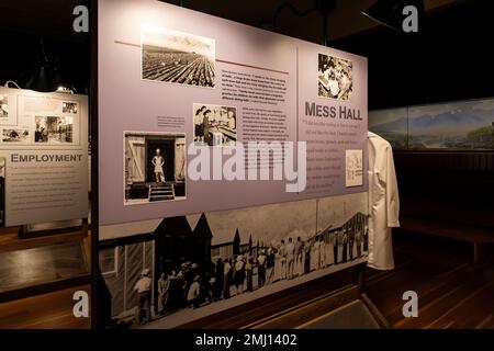 Exhibit about concentration camp mess halls in NPS Visitor Center at Manzanar National Historic Site, Owens Valley, California, USA Stock Photo
