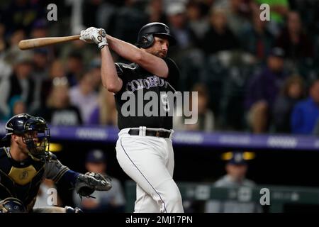 Colorado Rockies' Daniel Murphy (9) in action during a baseball