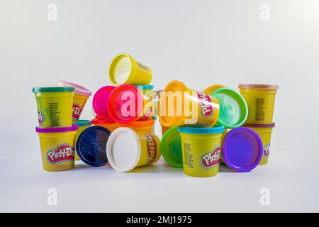 Cardiff Mid Glamorgan Wales UK January 27 2023 assorted cans of play doh modelling clay play dough in small sealable tubs for creating art and sculptu Stock Photo