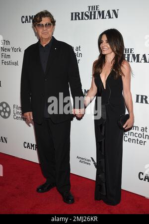 Robbie Robertson, left, and Janet Zuccarini attend the world premiere ...