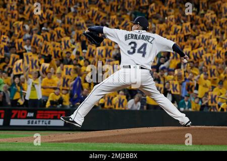 Seattle Mariners King's Court fans cheer a strike out by starting pitcher Felix  Hernandez against the Minnesota Twins in the third inning of a baseball  game Friday, July 26, 2013, in Seattle. (