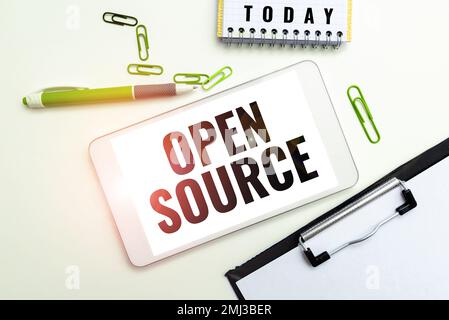 Sign displaying Open Source, Word Written on denoting software which original source code freely available Stock Photo