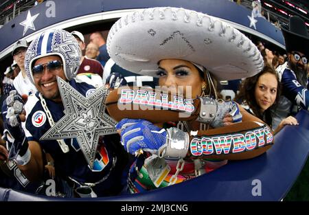 Fans celebrating Hispanic Heritage Month watch the Miami Dolphins and  Dallas Cowboys warm up before a NFL football game in Arlington, Texas,  Sunday, Sept. 22, 2019. (AP Photo/Ron Jenkins Stock Photo - Alamy