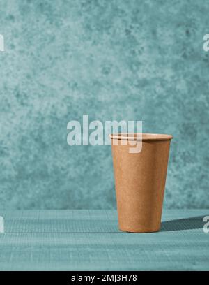 paper take away coffee cup on blue background Stock Photo