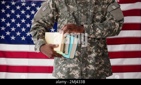 Young Student Soldier In Uniform. Veteran Study Stock Photo