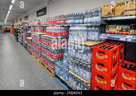 Shelves with mineral water and beverages in the wholesale market, Bavaria, Germany Stock Photo