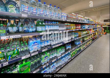 Shelves with mineral water and beverages in the wholesale market, Bavaria, Germany Stock Photo