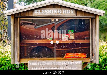 A blessing box is pictured at Saint Philip Neri Catholic Church, Jan. 1, 2023, in Theodore, Alabama. Blessing boxes are free community pantries. Stock Photo