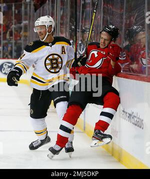 Boston Bruins goalie Hannu Toivonen adjusts his gear following the first  goal scored by Ottawa Senators right wing Chris Neil during the second  period at the TD Banknorth Garden in Boston on