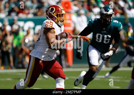 Washington Redskins' Derrius Guice runs during the first half of