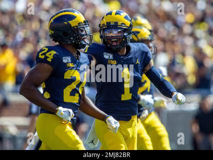 Michigan defensive back Lavert Hill (24) celebrates his