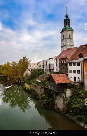 Skofja Loka with the river and St. Jacob Church, as seen from the Novi loski bridge over the Selška Sora River, Slovenia Stock Photo