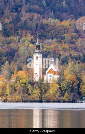 Famous alpine Bled lake (Blejsko jezero) in Slovenia, amazing autumn landscape. Scenic view of the lake, island with church, mountains  outdoor travel Stock Photo