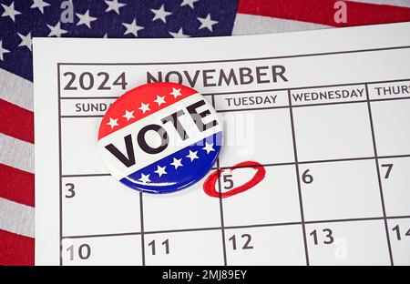 Flag vote button on Tuesday November 2024 calendar with a red circle Stock Photo