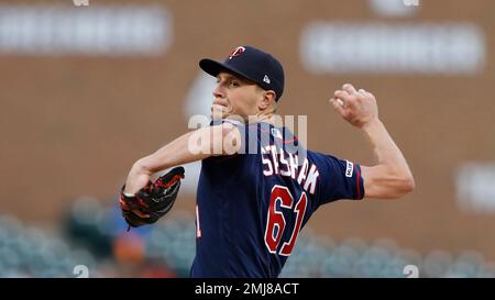 Minnesota Twins relief pitcher Cody Stashak (61) throws from the mound  during the fifth inning of a baseball game against the Tampa Bay Rays,  Saturday, April 30, 2022, in St. Petersburg, Fla. (