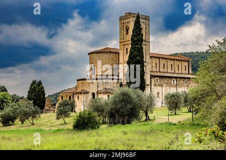 Abbey of Sant Antimo or Abbazia di Sant Antimo, a former Benedictine monastery in the Val d'Orcia in Tuscany, Italy. Stock Photo