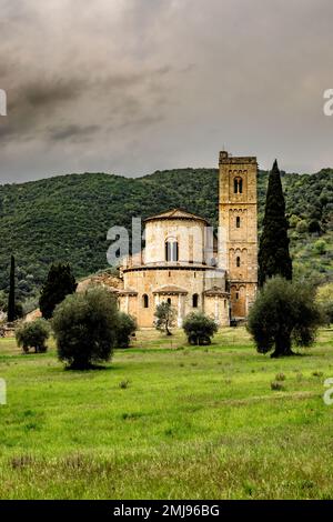 Abbey of Sant Antimo or Abbazia di Sant Antimo, a former Benedictine monastery in the Val d'Orcia in Tuscany, Italy. Stock Photo