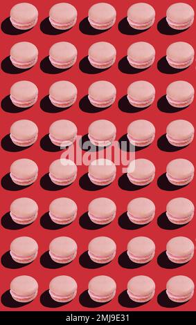 seamless pattern of pink macaroon cookies on red background  Stock Photo