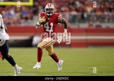 San Francisco 49ers' Jeff Wilson Jr. (41) runs against the Los Angeles  Chargers during the first half of an NFL preseason football game in Santa  Clara, Calif., Thursday, Aug. 29, 2019. (AP