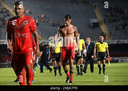 Veracruz players leave the field during a Mexican soccer league