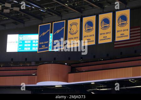 Golden State Warriors' championship banners and retired numbers as DeMarcus  Cousins warms up before playing Toronto Raptors in NBA Finals' Game 4 at  Oracle Arena in Oakland, Calif., on Friday, June 7