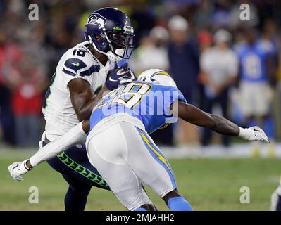 December 2, 2018: Seattle Seahawks wide receiver Jaron Brown (18) prepares  to stiff arm a defender during a game between the San Francisco 49ers and  the Seattle Seahawks at CenturyLink Field in