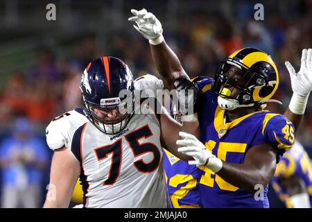 Denver Broncos offensive tackle Quinn Bailey (75) against the Los