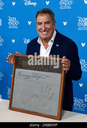 Directochoreographer Kenny Ortega poses during his handprint ceremony