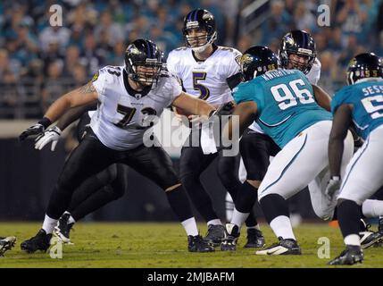 FILE - In this Monday, Oct. 24, 2011, file photo, Baltimore Ravens  offensive guard Marshal Yanda (73), left, blocks against Jacksonville  Jaguars defensive tackle Terrance Knighton (96) during an NFL football game