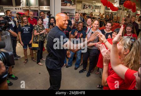 IMAGE DISTRIBUTED FOR JCPENNEY - Pittsburgh Steelers linebacker Ryan  Shazier poses for a photo with Amy Nichols, Fulton Elementary School 3rd  grade math specialist, after he surprised 24 teachers from the school with  a shopping spree at the