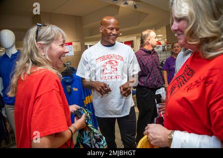 IMAGE DISTRIBUTED FOR JCPENNEY - Pittsburgh Steelers linebacker Ryan  Shazier poses for a photo with Amy Nichols, Fulton Elementary School 3rd  grade math specialist, after he surprised 24 teachers from the school with  a shopping spree at the