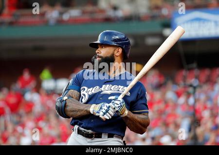 Milwaukee Brewers' Eric Thames stands in the dugout in the fourth inning of  a baseball game against the Cincinnati Reds, Sunday, July 1, 2018, in  Cincinnati. (AP Photo/John Minchillo Stock Photo - Alamy