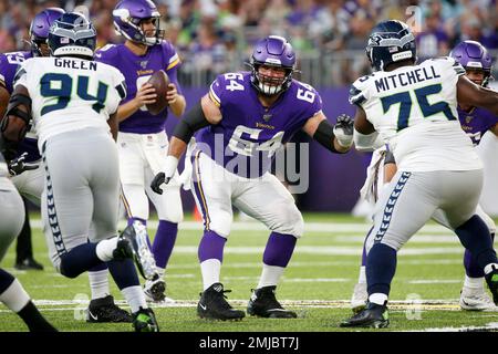 Minnesota Vikings offensive guard Josh Kline (64) sets to block