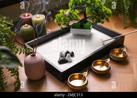 Beautiful miniature zen garden with incense sticks on table indoors Stock  Photo - Alamy