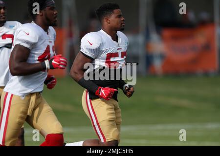 San Francisco 49ers outside linebacker Kwon Alexander (56) and Philadelphia  Eagles cornerback Cre'von LeBlanc (34)