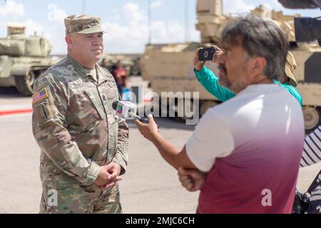 Command Sgt. Maj. Gerardo Gonzales, the Fort Bliss garrison command sergeant major, speaks to the media during the Meet Your Army expo at Fort Bliss, Texas, Aug. 26, 2022. Units from across Team Bliss and beyond set up at the 1st Armored Division and Fort Bliss Museum for a day long Soldier open house where the general public was invited on post to learn about today’s Army and the Soldiers who see its many missions through everyday. Stock Photo