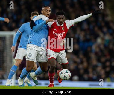 Manchester, UK. 28th Jan, 2023. Arsenal's Eddie Nketiah (R) vies for the ball during the FA Cup fourth round match between Manchester City and Arsenal in Manchester, Britain, Jan. 27, 2023. Credit: Xinhua/Alamy Live News Stock Photo