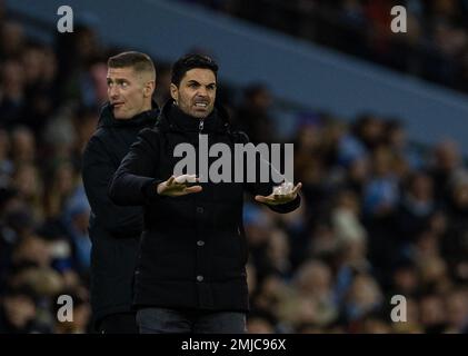 Manchester, UK. 28th Jan, 2023. Arsenal's manager Mikel Arteta (R) reacts during the FA Cup fourth round match between Manchester City and Arsenal in Manchester, Britain, Jan. 27, 2023. Credit: Xinhua/Alamy Live News Stock Photo