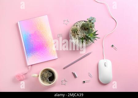 Flat lay composition with mouse and cup of coffee on pink background Stock Photo