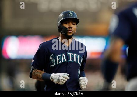 Seattle Mariners' J.P. Crawford (3) is greeted by Ty France after Crawford  scored in the eighth inning of the team's baseball game against the Los  Angeles Angels, Friday, April 30, 2021, in