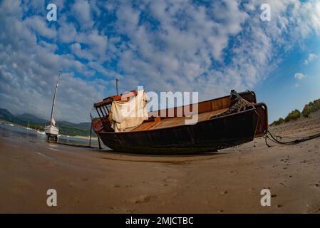 Boat at Barmouth Bay, Barmouth, Gwynedd, Wales Stock Photo