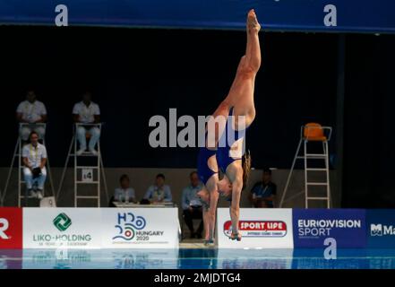 Britain's Phoebe Banks and Emily Martin compete on their way to win the ...